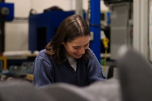 Team members smiles in the workshop