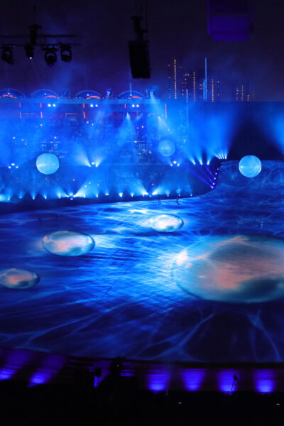 Stage with blue lights, floor projections and 3D pearl stage props.