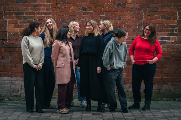 Group of women smiling and looking happy