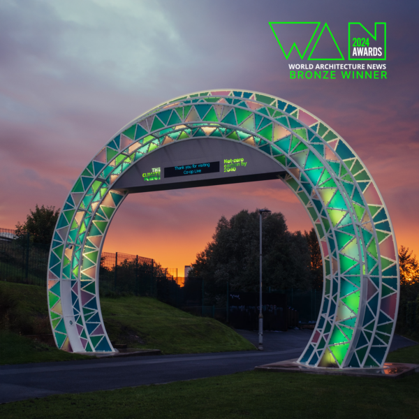 Large archway with graphics depicting an award win
