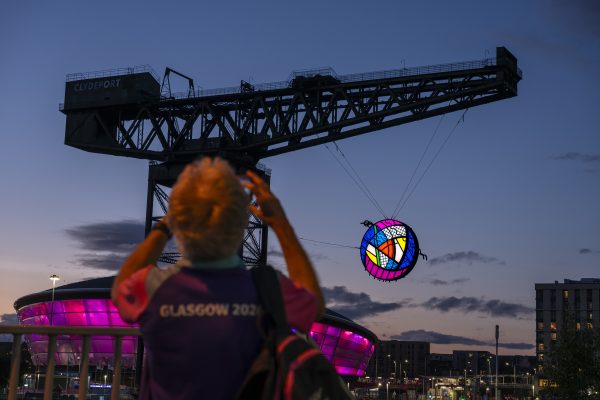 The Glasgow Rose suspended from the Finnieston Crane at sunset, overlooking the OVO Hydro in Glasgow.